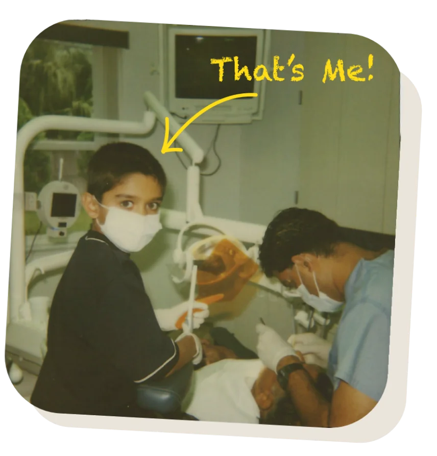 Dr. Patel as a child in his father's dental practice
