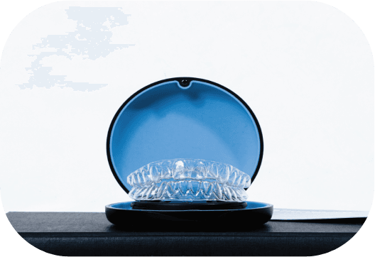 An Invisalign aligner in its case